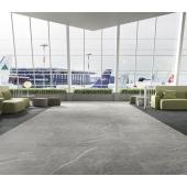 nagymeretu matt etterem marvany kozossegi ter modern szurke kohatasu greslap jarolap padlolap padloburkolat modern minimal nappali.jpg